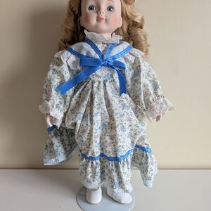 Floral Porcelain Doll with Blue Accents
